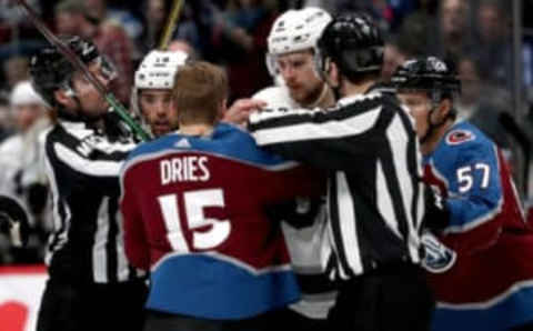 DENVER, COLORADO – JANUARY 19: Sheldon Dries #15 of the Colorado Avalanche fights with Adrian Kempe #9 of the Los Angeles Kings in the third period at the Pepsi Center on January 19, 2019 in Denver, Colorado. (Photo by Matthew Stockman/Getty Images)