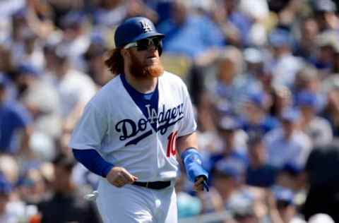 April 3, 2017; Los Angeles, CA, USA; Los Angeles Dodgers third baseman Justin Turner (10) scores a run in the fourth inning against the San Diego Padres during the opening day game at Dodger Stadium. Mandatory Credit: Gary A. Vasquez-USA TODAY Sports