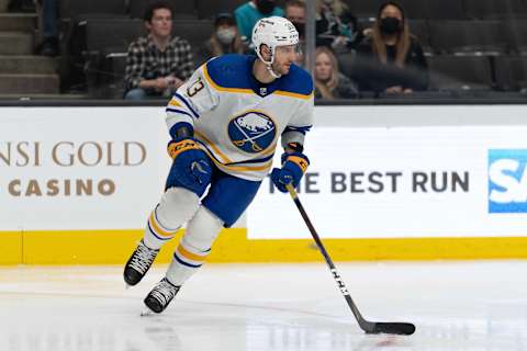 Nov 2, 2021; San Jose, California, USA; Buffalo Sabres defenseman Colin Miller (33) controls the puck during the second period against the San Jose Sharks at SAP Center at San Jose. Mandatory Credit: Stan Szeto-USA TODAY Sports