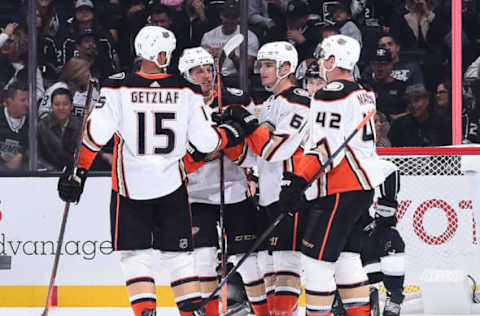 LOS ANGELES, CA – SEPTEMBER 29: Ryan Getzlaf #15, Rickard Rakell #67, Troy Terry #61 and Josh Manson #42 of the Anaheim Ducks celebrate Terry’s first-period goal during the preseason game against the Los Angeles Kings at STAPLES Center on September 29, 2018, in Los Angeles, California. (Photo by Juan Ocampo/NHLI via Getty Images)