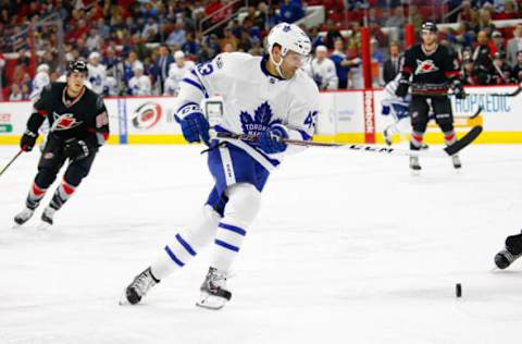 Feb 19, 2017; Raleigh, NC, USA; Toronto Maple Leafs forward Nazem Kadri (43) skates with the puck against the Carolina Hurricanes at PNC Arena. The Toronto Maple Leafs defeat the Carolina Hurricanes 4-0. Mandatory Credit: James Guillory-USA TODAY Sports