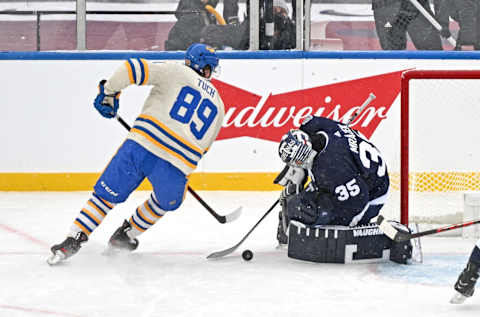 Mar 13, 2022; Hamilton, Ontario, CAN; Toronto Maple Leafs goalie Petr Mrazek (35) makes a save on a shot from Buffalo Sabres forward Alex Tuch (89) in the first period of the 2022 Heritage Classic ice hockey game at Tim Hortons Field. Mandatory Credit: Dan Hamilton-USA TODAY Sports