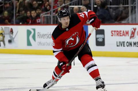 NEWARK, NEW JERSEY – NOVEMBER 01: Sami Vatanen #45 of the New Jersey Devils takes a shot in the second period against the Philadelphia Flyers at Prudential Center on November 01, 2019 in Newark, New Jersey. (Photo by Elsa/Getty Images)