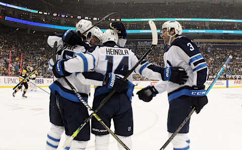 Winnipeg Jets, Mark Scheifele, Tucker Poolman, Ville Heinola (Mandatory Credit: Charles LeClaire-USA TODAY Sports)