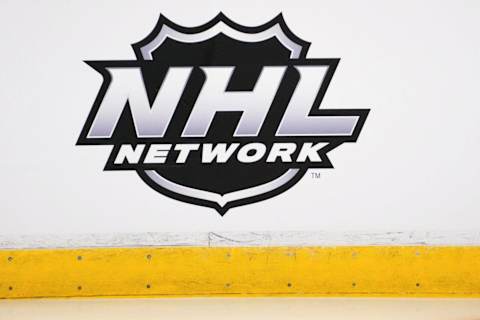 Nov 18, 2021; Sunrise, Florida, USA; A detailed view of the NHL network logo on a dasher board at FLA Live Arena prior to the game between the Florida Panthers and New Jersey Devils. Mandatory Credit: Jasen Vinlove-USA TODAY Sports