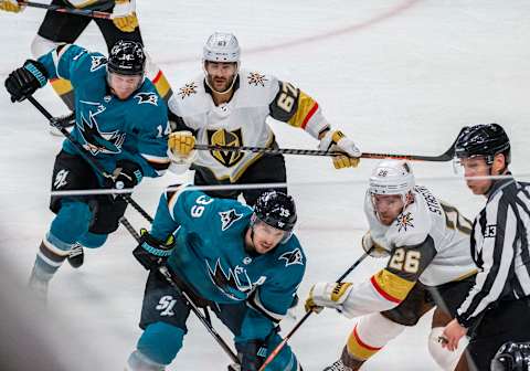 SAN JOSE, CA – APRIL 23: San Jose Sharks center Logan Couture (39) and Vegas Golden Knights center Paul Stastny (26) scramble for control during overtime in Game 7, Round 1 between the Vegas Golden Knights and the San Jose Sharks on Tuesday, April 23, 2019 at the SAP Center in San Jose, California. (Photo by Douglas Stringer/Icon Sportswire via Getty Images)