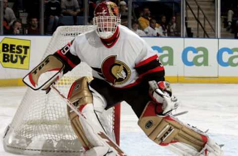 UNIONDALE, NY – NOVEMBER 25: Goaltender Dominik Hasek #39 of the Ottawa Senators looks to play the puck against the New York Islanders during their game on November 25, 2005 at Nassau Coliseum in Uniondale, New York. The Sens defeated the Isles 6-2. (Photo by Jim McIsaac/Getty Images)