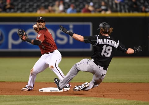 PHOENIX, AZ – SEPTEMBER 14: Jean Segura #2 of the Arizona Diamondbacks turns a double play as Charlie Blackmon #19 of the Colorado Rockies slides into second base during the fifth inning at Chase Field on September 14, 2016, in Phoenix, Arizona. (Photo by Norm Hall/Getty Images)