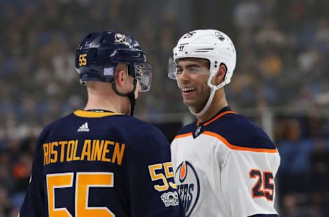 BUFFALO, NY – NOVEMBER 24: Rasmus Ristolainen #55 of the Buffalo Sabres and Darnell Nurse #25 of the Edmonton Oilers at the KeyBank Center on November 24, 2017 in Buffalo, New York. (Photo by Kevin Hoffman/Getty Images)