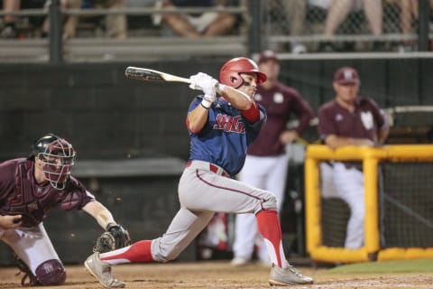 HATTIESBURG, MS – JUNE 02: South Alabama outfielder Travis Swaggerty (21) gets a single during an NCAA Division I Regional baseball game between the South Alabama Jaguars and the Mississippi State Bulldogs on June 02, 2017 at Pete Taylor Park, Hattiesburg, MS. (Photo by Bobby McDuffie/Icon Sportswire via Getty Images)