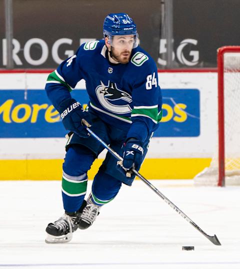 VANCOUVER, BC – MARCH 22: Tyler Motte #64 of the Vancouver Canucks skates during NHL action against the Winnipeg Jets at Rogers Arena on March 22, 2021 in Vancouver, Canada. (Photo by Rich Lam/Getty Images)