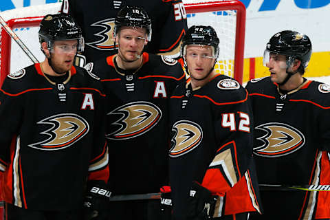 ANAHEIM, CA – DECEMBER 6: Cam Fowler #4, Corey Perry #10, Josh Manson #42, and Adam Henrique #14 of the Anaheim Ducks wait for a face-off during the game against the Ottawa Senators on December 6, 2017, at Honda Center in Anaheim, California. (Photo by Debora Robinson/NHLI via Getty Images)