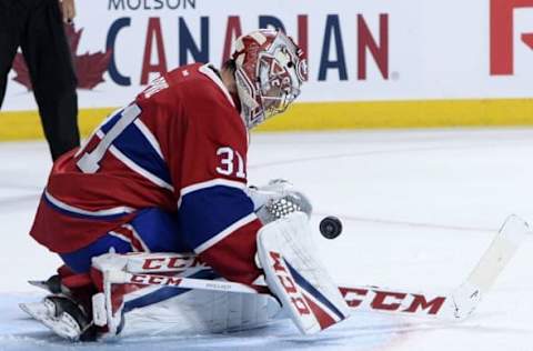 NHL Power Rankings: Montreal Canadiens goalie Carey Price (31) makes a save during the third period of the game against the Vancouver Canucks at the Bell Centre. Mandatory Credit: Eric Bolte-USA TODAY Sports