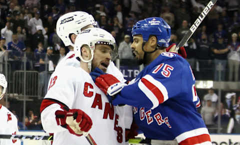 Ryan Reaves #75 of the New York Rangers confronts Max Domi #13 of the Carolina Hurricanes near the end of their game(Photo by Bruce Bennett/Getty Images)