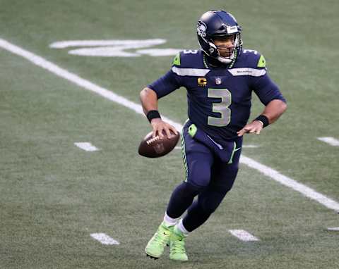 SEATTLE, WASHINGTON – JANUARY 09: Russell Wilson #3 of the Seattle Seahawks  (Photo by Steph Chambers/Getty Images)