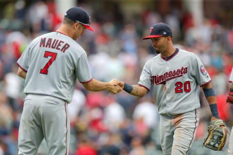 CLEVELAND, OH – JUNE 16: Minnesota Twins first baseman Joe Mauer (7) and Minnesota Twins left fielder Eddie Rosario (20) celebrate following the Major League Baseball game between the Minnesota Twins and Cleveland Indians on June 16, 2018, at Progressive Field in Cleveland, OH. Minnesota defeated Cleveland 9-3. (Photo by Frank Jansky/Icon Sportswire via Getty Images)