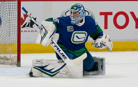 Mikey DiPietro of the Vancouver Canucks. (Photo by Rich Lam/Getty Images)