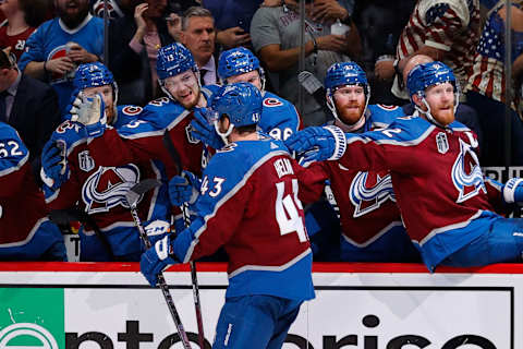 Jun 18, 2022; Denver, Colorado, USA; Colorado Avalanche center Darren Helm (43) is congratulated following his goal against the Tampa Bay Lightning during the second period in game two of the 2022 Stanley Cup Final at Ball Arena. Mandatory Credit: Isaiah J. Downing-USA TODAY Sports