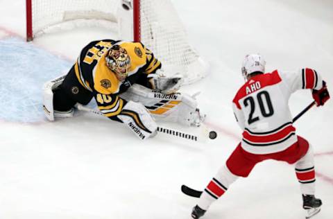 BOSTON, MASSACHUSETTS – MAY 09: Tuukka Rask #40 of the Boston Bruins makes a save against Sebastian Aho #20 of the Carolina Hurricanes during the second period in Game One of the Eastern Conference Final during the 2019 NHL Stanley Cup Playoffs at TD Garden on May 09, 2019 in Boston, Massachusetts. (Photo by Adam Glanzman/Getty Images)