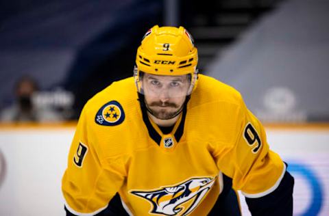 NASHVILLE, TN – JANUARY 14: Filip Forsberg #9 of the Nashville Predators readies for a face off outside the circle during the third period against the Columbus Blue Jackets at Bridgestone Arena on January 14, 2021 in Nashville, Tennessee. Nashville defeats Columbus 3-1. (Photo by Brett Carlsen/Getty Images)