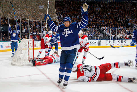 TORONTO, ON – DECEMBER 19: Connor Carrick #8 of the Toronto Maple Leafs celebrates after scoring on Scott Darling #33 of the Carolina Hurricanes during the third period at the Air Canada Centre on December 19, 2017 in Toronto, Ontario, Canada. (Photo by Mark Blinch/NHLI via Getty Images)