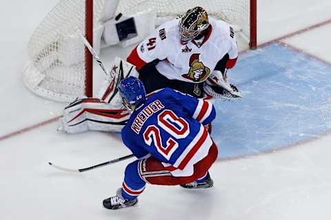 May 9, 2017; New York, NY, USA; New York Rangers left wing Chris Kreider (20) scores a goal past Ottawa Senators goalie Craig Anderson (41) during the third period in game six of the second round of the 2017 Stanley Cup Playoffs at Madison Square Garden. Mandatory Credit: Adam Hunger-USA TODAY Sports