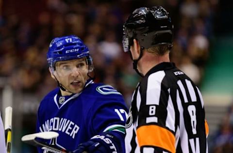 Mar 12, 2016; Vancouver, British Columbia, CAN; Vancouver Canucks forward Radim Vrbata (17) talks with referee Dave Jackson (8) during the second period at Rogers Arena. The Vancouver Canucks won 4-2. Mandatory Credit: Anne-Marie Sorvin-USA TODAY Sports