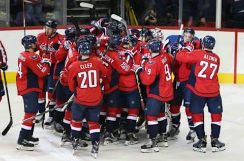 NHL Power Rankings: Washington Capitals left wing Alex Ovechkin (8) celebrates with teammates after scoring the game winning goal against the Toronto Maple Leafs in overtime at Verizon Center. The Capitals won 6-5 in overtime. Mandatory Credit: Amber Searls-USA TODAY Sports