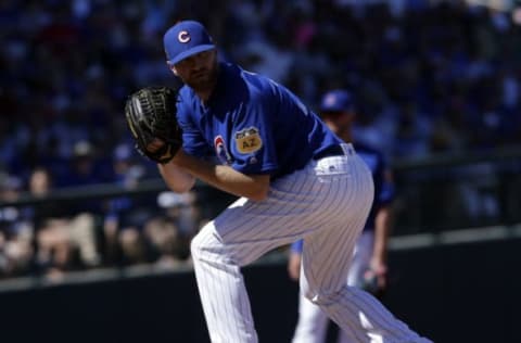 Mar 9, 2017; Mesa, AZ, USA; Chicago Cubs relief pitcher Wade Davis (71) gets ready to pitch in the fifth inning during a spring training game against the Seattle Mariners at Sloan Park. Mandatory Credit: Rick Scuteri-USA TODAY Sports