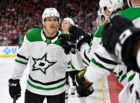 RALEIGH, NORTH CAROLINA – FEBRUARY 25: Denis Gurianov #34 of the Dallas Stars celebrates with teammates after scoring a goal against the Carolina Hurricanes during the second period at PNC Arena on February 25, 2020 in Raleigh, North Carolina. (Photo by Grant Halverson/Getty Images)