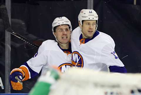 Casey Cizikas #53 of the New York Islanders (l). (Photo by Bruce Bennett/Getty Images)