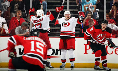 Jussi Jokinen #36 and Rod Brind’Amour #17 of the Carolina Hurricanes (Photo by Bruce Bennett/Getty Images)