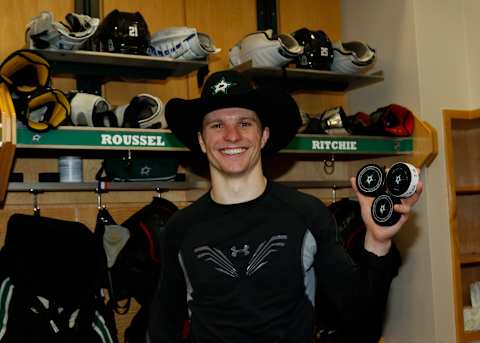 DALLAS, TX – FEBRUARY 18: Antoine Roussel #21 of the Dallas Stars poses with the pucks from his first career hat-trick against the Tampa Bay Lightning at the American Airlines Center on February 18, 2017 in Dallas, Texas. (Photo by Glenn James/NHLI via Getty Images)