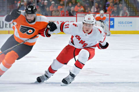 PHILADELPHIA, PA – MARCH 05: Jake Gardiner #51 of the Carolina Hurricanes holds off Chris Stewart #44 of the Philadelphia Flyers in the first period at Wells Fargo Center on March 5, 2020 in Philadelphia, Pennsylvania. (Photo by Drew Hallowell/Getty Images)