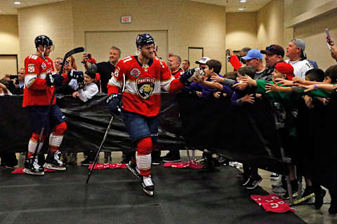 SUNRISE, FL – FEBRUARY 1: Jonathan Huberdeau #11 and Aleksander Barkov #16 of the Florida Panthers are greeted by fans on the way out to the ice prior to the start of the game against the Nashville Predators at the BB&T Center on February 1, 2019 in Sunrise, Florida. (Photo by Eliot J. Schechter/NHLI via Getty Images)