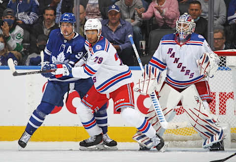 TORONTO, ON – OCTOBER 18: K’Andre Miller #79 of the New York Rangers battles Auston Matthews #34 of the Toronto Maple Leafs for position in front of the net at Scotiabank Arena on October 18, 2021 in Toronto, Ontario, Canada. (Photo by Claus Andersen/Getty Images)