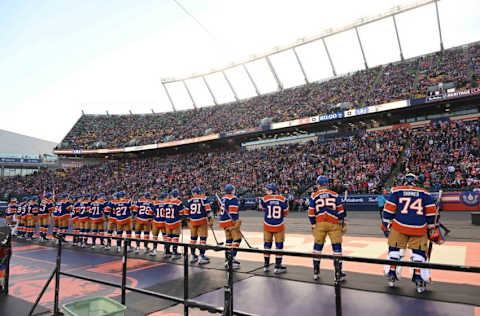 Oct 29, 2023; Edmonton, Alberta, CAN; Edmonton Oilers goalie Stuart Skinner (74) leads the team out before the first period in the 2023 Heritage Classic ice hockey game at Commonwealth Stadium. Mandatory Credit: Walter Tychnowicz-USA TODAY Sports