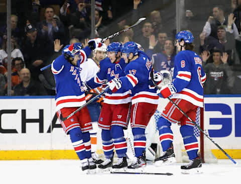 NEW YORK, NEW YORK – JANUARY 13: The New York Rangers celebrate a first period goal by Jesper Fast #17 against the New York Islanders at Madison Square Garden on January 13, 2020 in New York City. (Photo by Bruce Bennett/Getty Images)