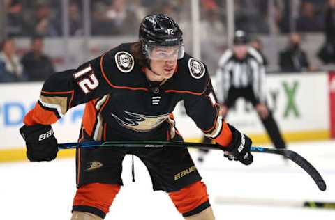 ANAHEIM, CALIFORNIA – NOVEMBER 18: Sonny Milano #12 of the Anaheim Ducks looks on during the first period of a game against the Carolina Hurricanes at Honda Center on November 18, 2021, in Anaheim, California. (Photo by Sean M. Haffey/Getty Images)