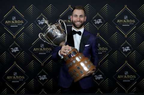 LAS VEGAS, NEVADA – JUNE 19: Jason Zucker of the Minnesota Wild poses with the King Clancy Memorial Trophy given to player who best exemplifies leadership qualities on and off the ice and has made a noteworthy humanitarian contribution in his community during the 2019 NHL Awards at the Mandalay Bay Events Center on June 19, 2019, in Las Vegas, Nevada. (Photo by Bruce Bennett/Getty Images)