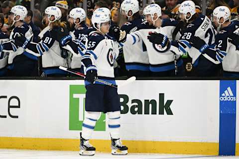 BOSTON, MASSACHUSETTS – DECEMBER 22: Mark Scheifele #55 of the Winnipeg Jets celebrates with his teammates after scoring a goal against the Boston Bruins during the first period at the TD Garden on December 22, 2022, in Boston, Massachusetts. (Photo by Brian Fluharty/Getty Images)