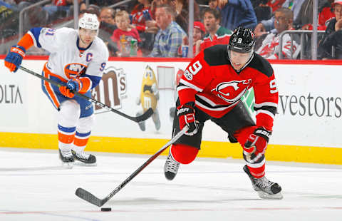 NEWARK, NJ – FEBRUARY 18: Taylor Hall #9 of the New Jersey Devils in action against John Tavares #91 of the New York Islanders on February 18, 2017 at Prudential Center in Newark, New Jersey. The Devils defeated the Islanders 3-2. (Photo by Jim McIsaac/Getty Images)