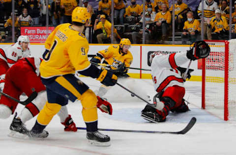 NASHVILLE, TENNESSEE – MAY 23: Goalie Alex Nedeljkovic #39 of the Carolina Hurricanes makes a save on a shot by Erik Haula #56 of the Nashville Predators during the third period in Game Four of the First Round of the 2021 Stanley Cup Playoffs at Bridgestone Arena on May 23, 2021, in Nashville, Tennessee. (Photo by Frederick Breedon/Getty Images)