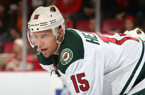 DETROIT, MI – MARCH 23: Dany Heatley #15 of the Minnesota Wild gets set for the face-off against the Detroit Red Wings during an NHL game on March 23, 2014 at Joe Louis Arena in Detroit, Michigan. Minnesota defeated Detroit 4-3 in OT (Photo by Dave Reginek/NHLI via Getty Images)