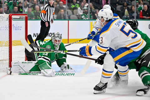 Jan 23, 2023; Dallas, Texas, USA; Dallas Stars goaltender Jake Oettinger (29) turns away a shot by Buffalo Sabres left wing Jeff Skinner (53) during the first period at the American Airlines Center. Mandatory Credit: Jerome Miron-USA TODAY Sports