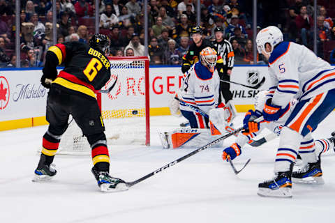 Nov 6, 2023; Vancouver, British Columbia, CAN; Edmonton Oilers defenseman Cody Ceci (5) watches as Vancouver Canucks forward Brock Boeser (6) scores on Edmonton Oilers goalie Stuart Skinner (74) in the third period at Rogers Arena. Vancouver won 6-2. Mandatory Credit: Bob Frid-USA TODAY Sports