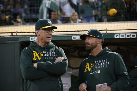 OAKLAND, CA – JUNE 11: Manager Bob Melvin #6 and Bench Coach Ryan Christenson #29 of the Oakland Athletics in the dugout during the game against the Kansas City Royals at RingCentral Coliseum on June 11, 2021 in Oakland, California. The Athletics defeated the Royals 4-3. (Photo by Michael Zagaris/Oakland Athletics/Getty Images)