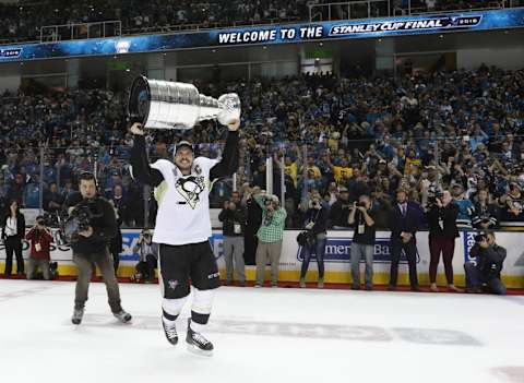 Jun 12, 2016; San Jose, CA, USA; Pittsburgh Penguins center Sidney Crosby (87) celebrates and hoists the Stanley Cup after defeating the San Jose Sharks in game six of the 2016 Stanley Cup Final at SAP Center at San Jose. Mandatory Credit: Bruce Bennett/Pool Photo via USA TODAY Sports