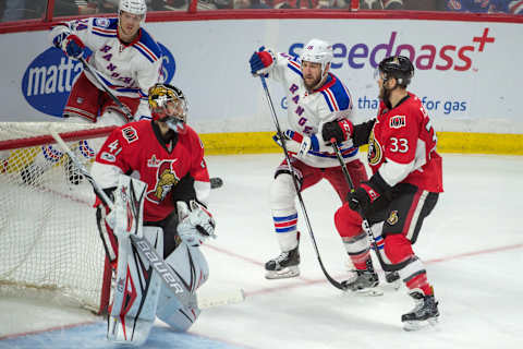 Apr 8, 2017; Ottawa, Ontario, CAN; Ottawa Senators goalie Craig Anderson (41) makes a save in front of New York Rangers left wing Tanner Glass (15) in the third period at the Canadian Tire Centre. The Senators defeated the Rangers 3-1. Mandatory Credit: Marc DesRosiers-USA TODAY Sports