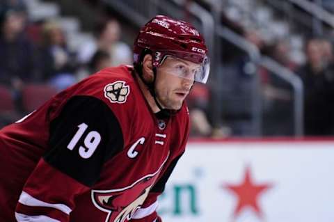 Oct 30, 2015; Glendale, AZ, USA; Arizona Coyotes right wing Shane Doan (19) looks on during the face off during the third period against the Vancouver Canucks at Gila River Arena. Mandatory Credit: Matt Kartozian-USA TODAY Sports